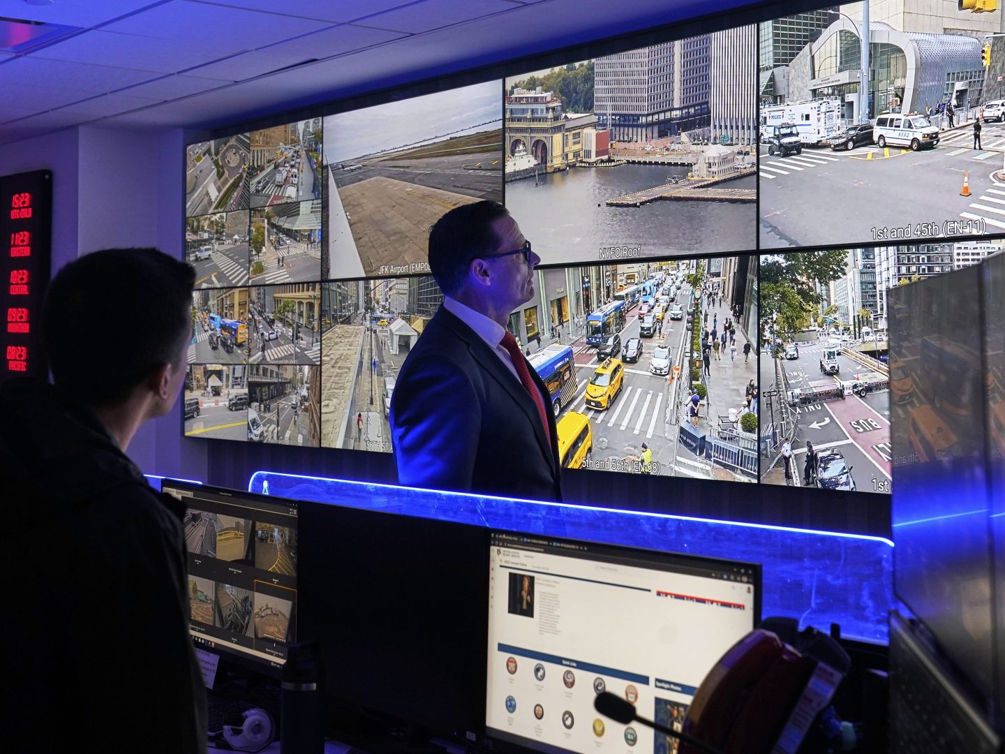 U.S. Secret Service Special Agent in Charge Matt McCool, center, looks at live video surveillance feeds in the agency's New York Field Office, in the Brooklyn borough of New York, Monday, Sept. 22, 2025.