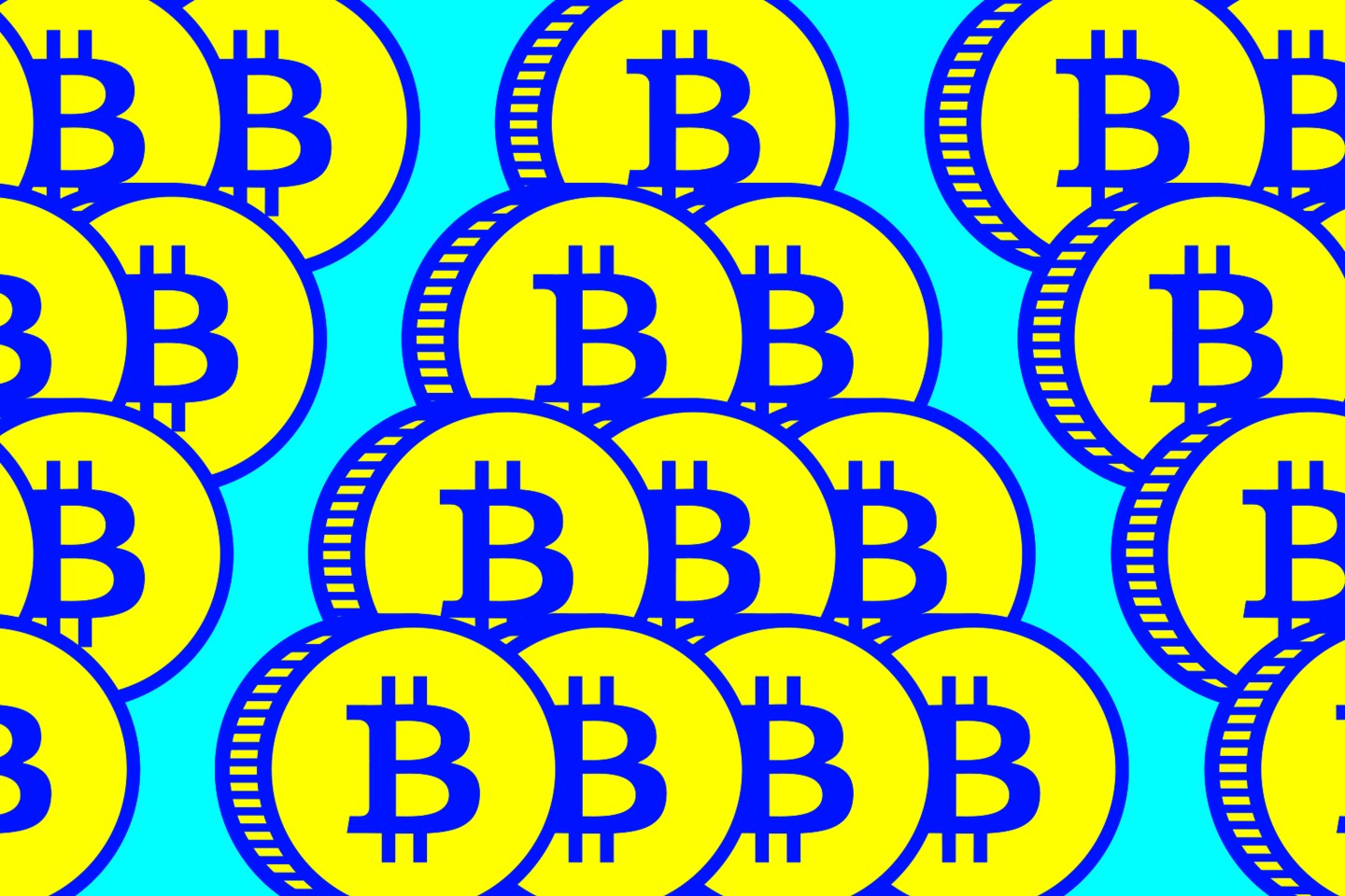 A stack of coins with the Bitcoin logo on them.