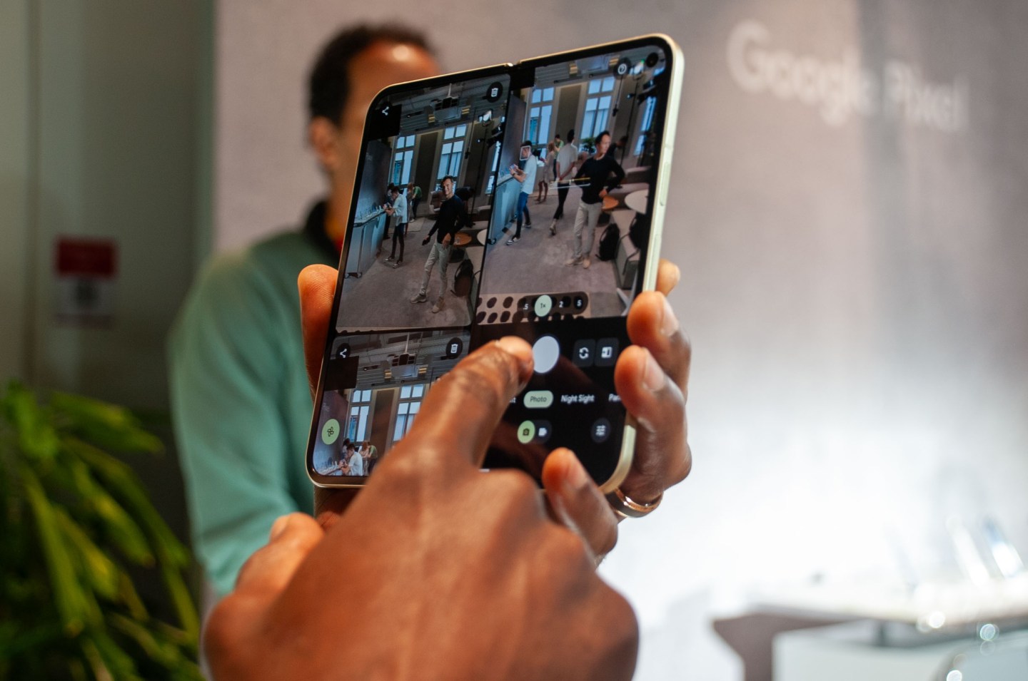 A man holding Google Pixel 10 Pro Fold